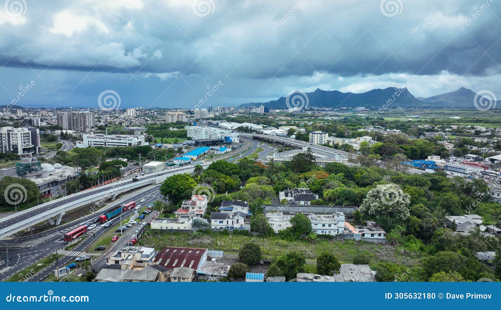 aerial view of quatre bornes city with mountains in background