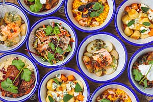 Overhead Shot Of Different Types Of Dishes In Bowls Near Each Other On Overhead Shot Of Different Types Of Dishes In Bowls Near Each Other On