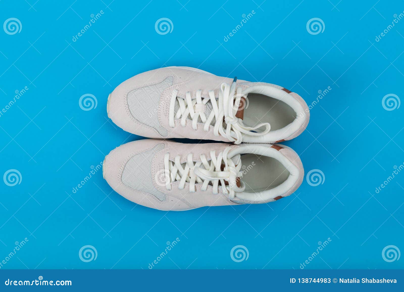 Overhead Shot of White Sneakers on Colored Background Stock Image ...