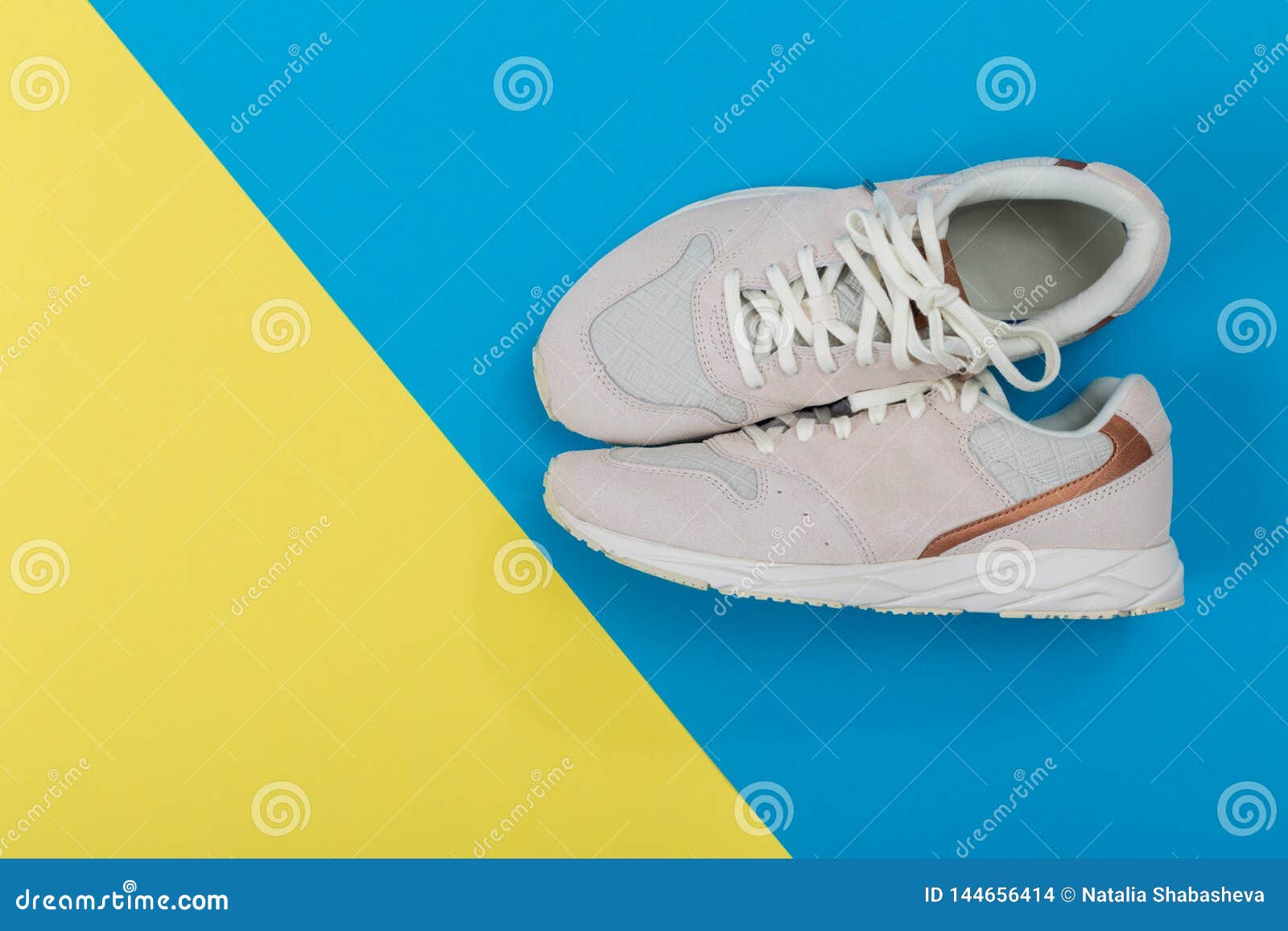 Overhead Shot of White Sneakers on Colored Background Stock Photo ...