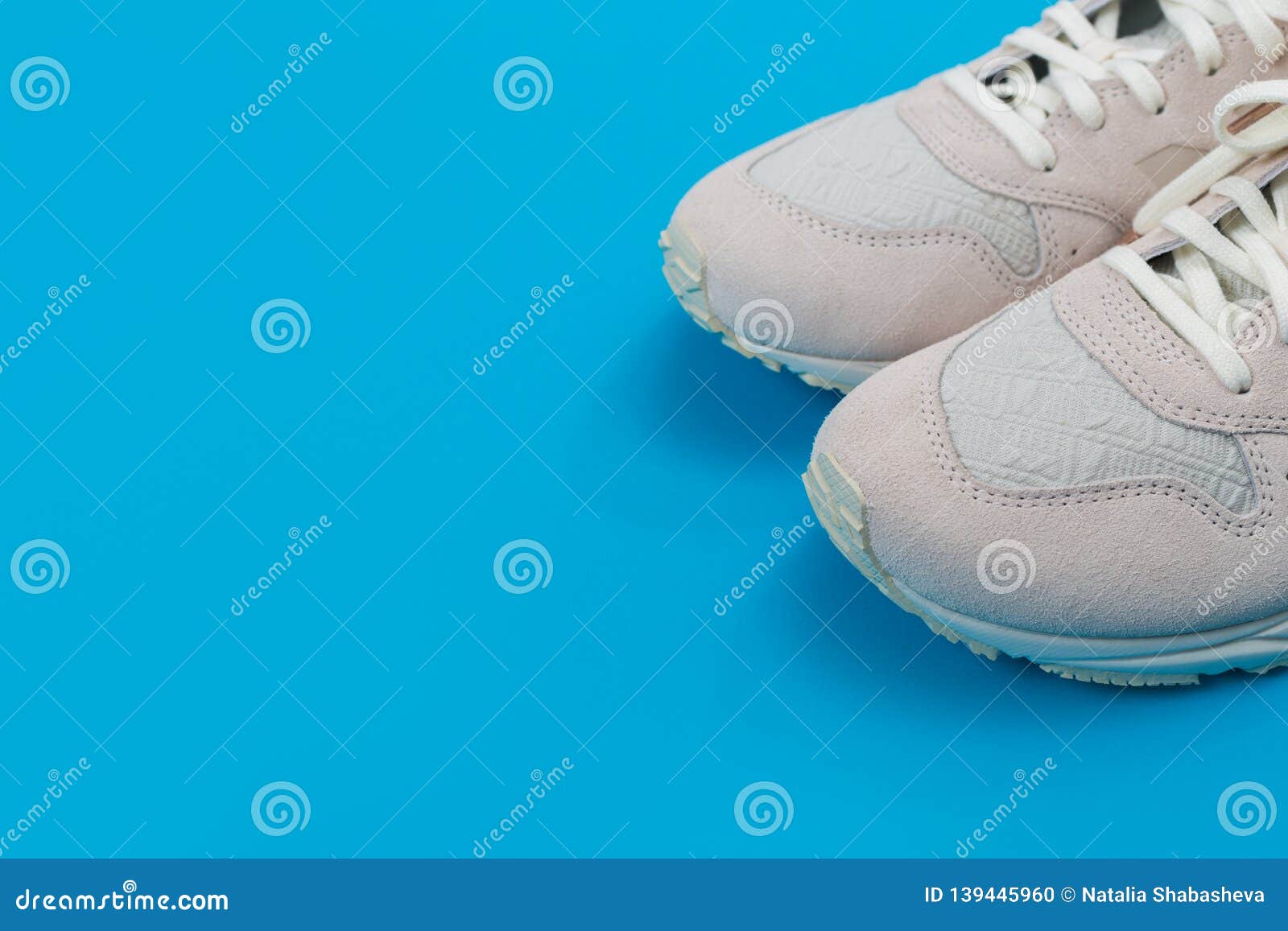 Overhead Shot of White Sneakers on Colored Background Stock Photo ...