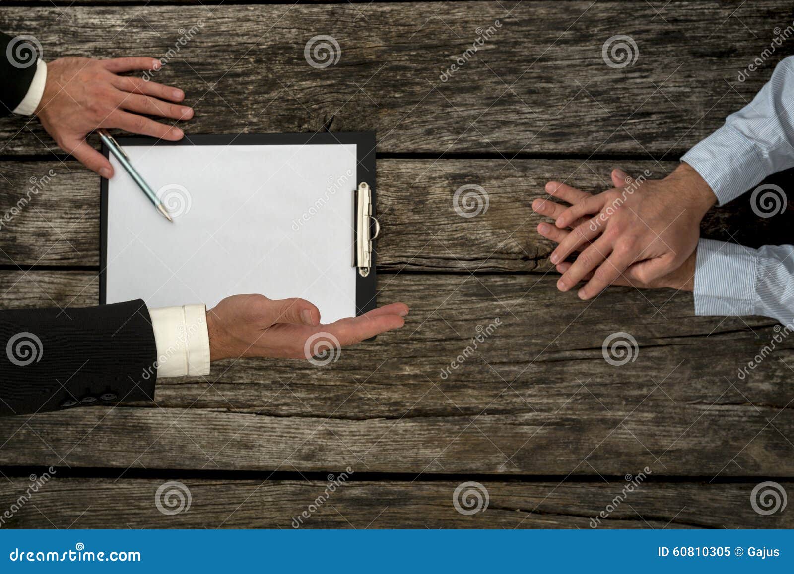 overhead view of business employer an employee sitting at office