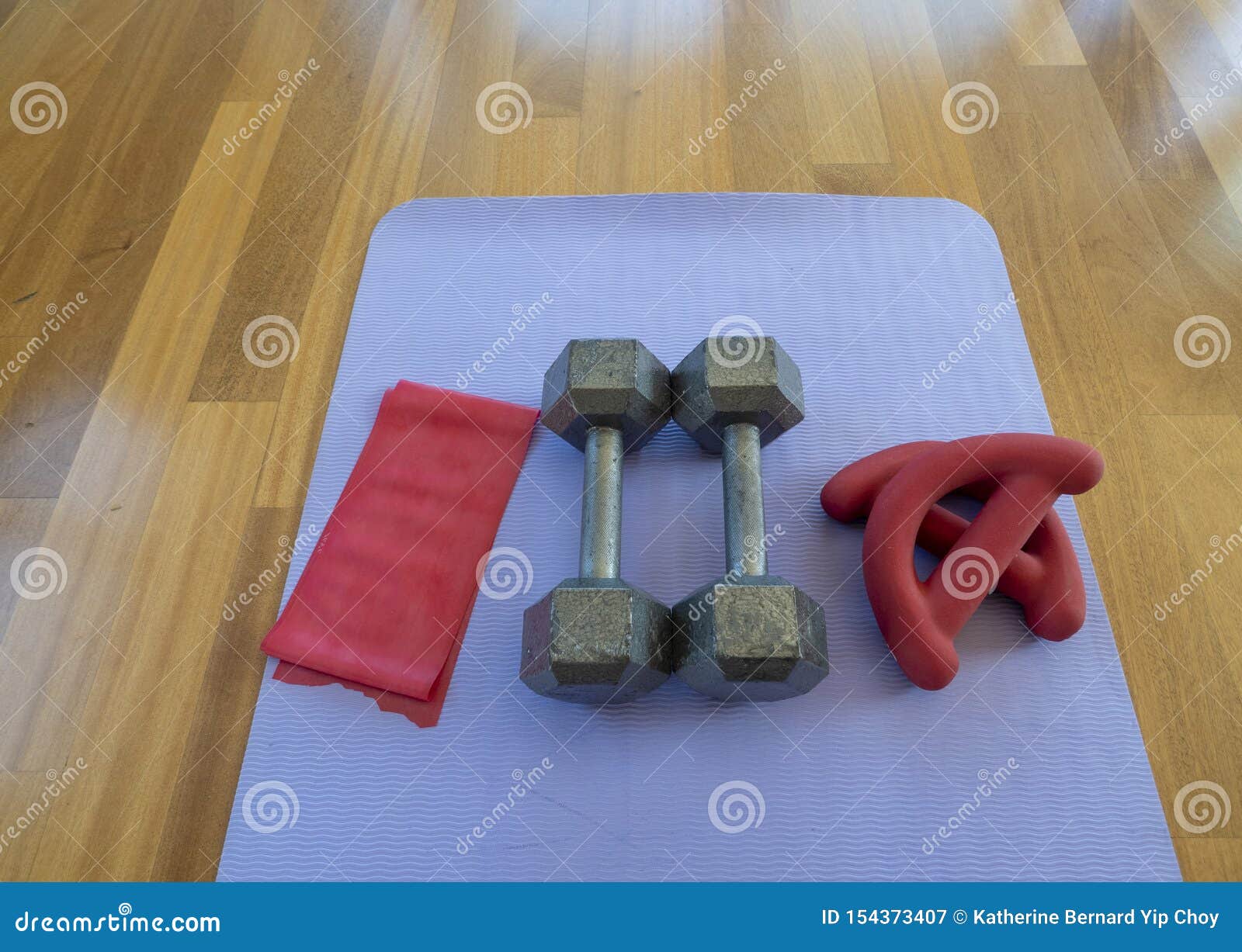 Overhead View Of A Pair Of Dumbbells Theraband Exercise Bands