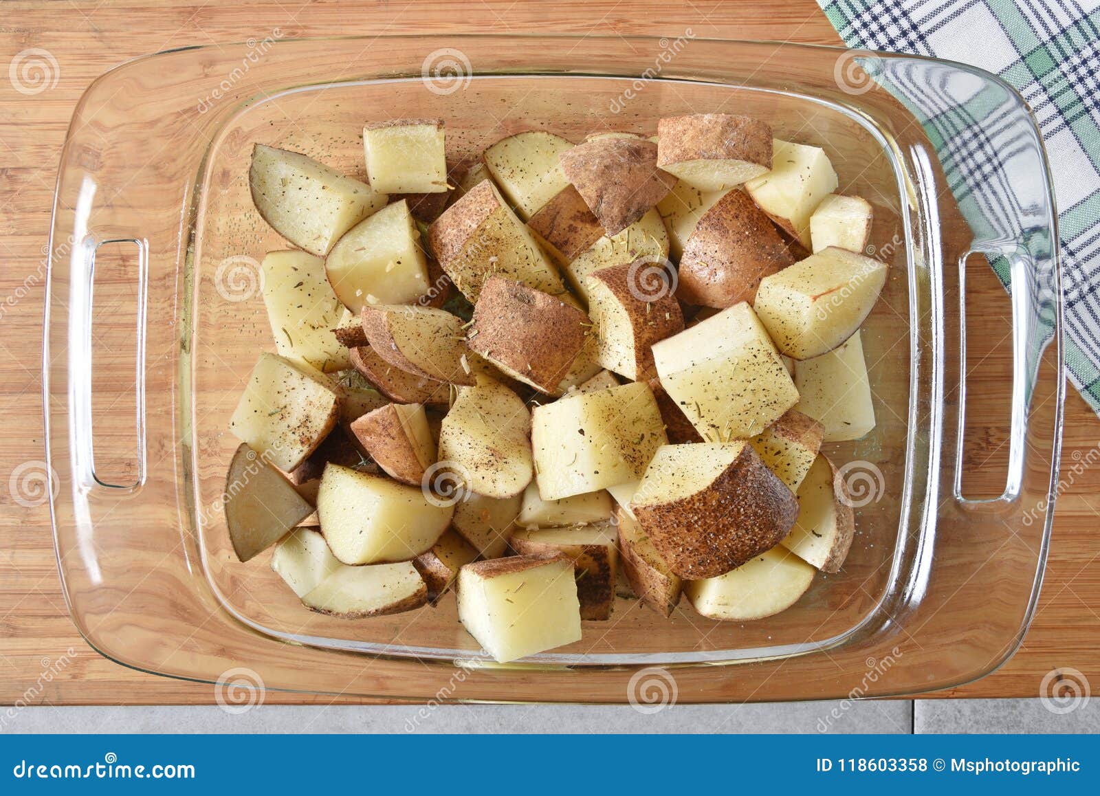 Potatoes in a baking dish stock photo. Image of russet - 118603358