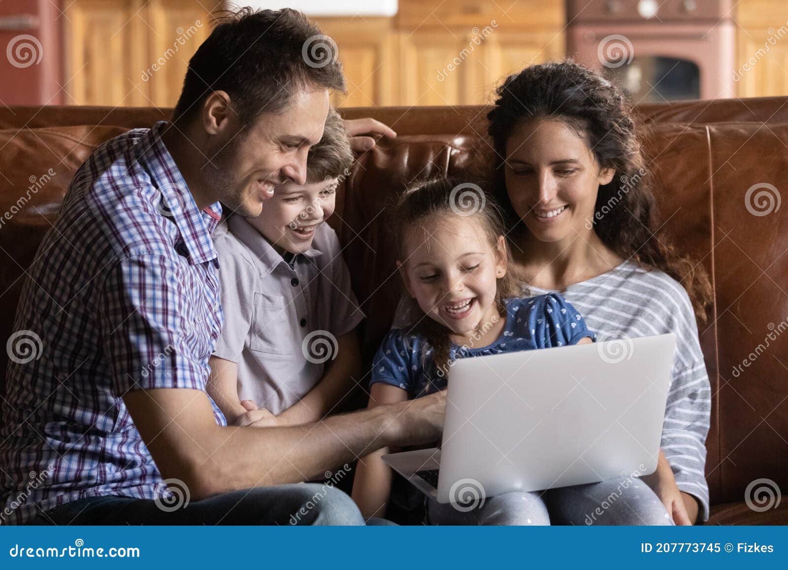 Overjoyed Family with Kids Watch Video on Laptop Stock Image - Image of  father, candid: 207773745