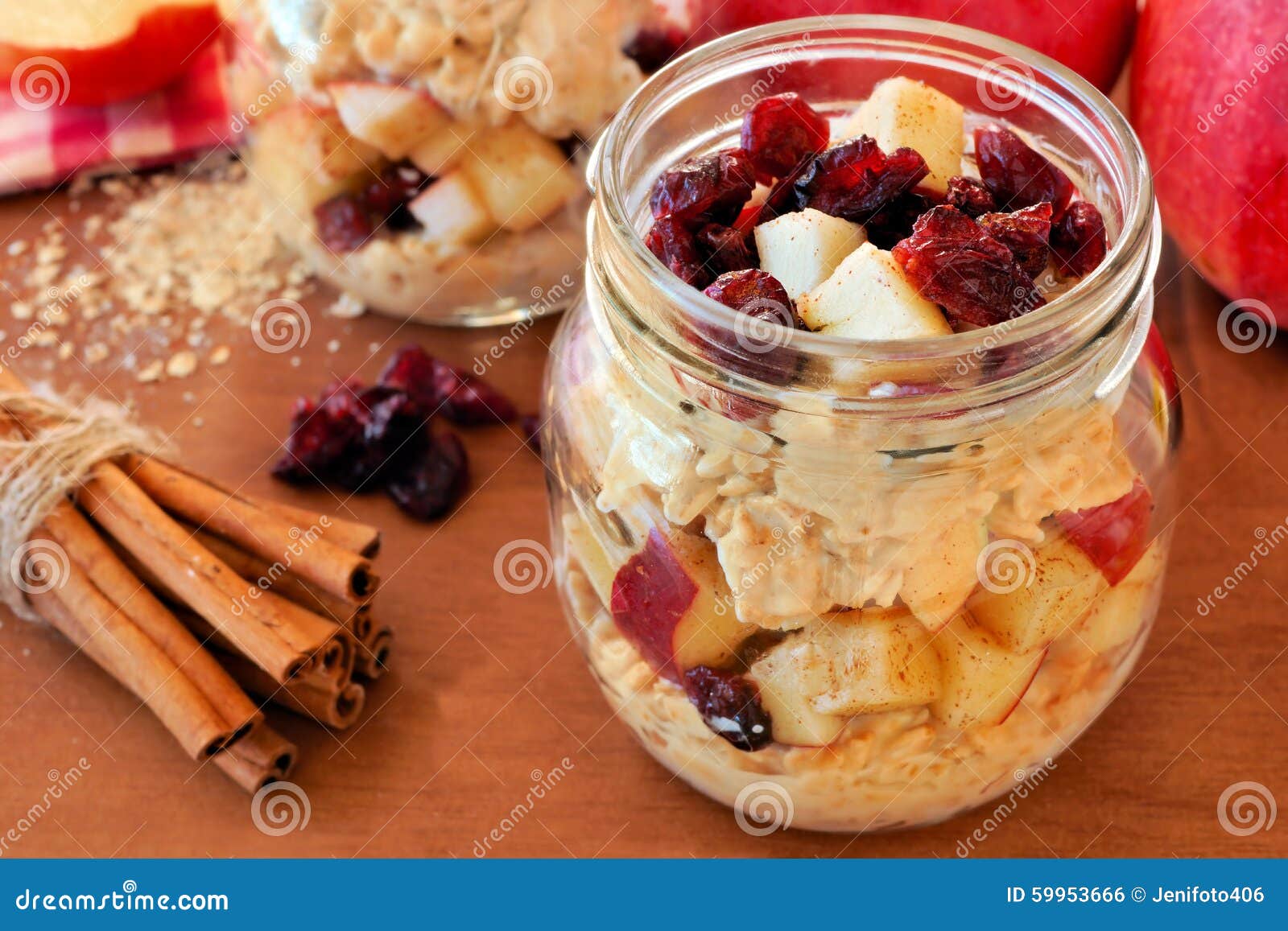 overnight oats with apples and cranberries in a mason jar