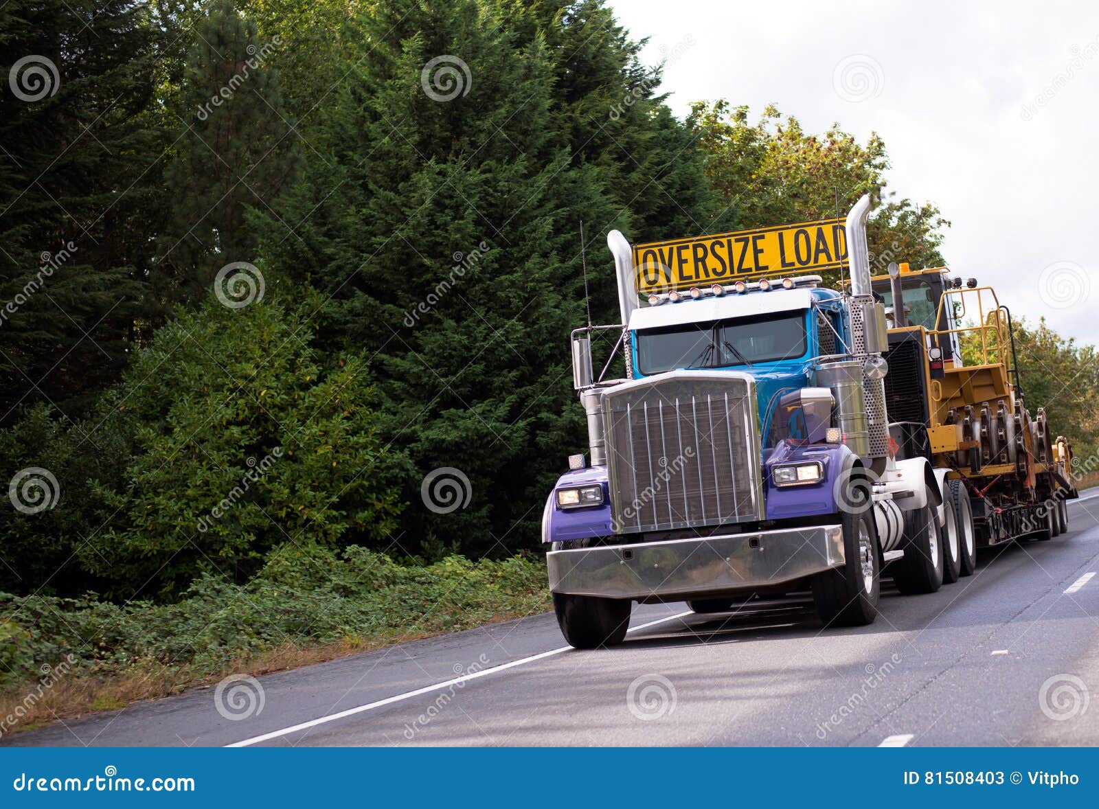 oversize load big rig classic semi truck with step down flat bed