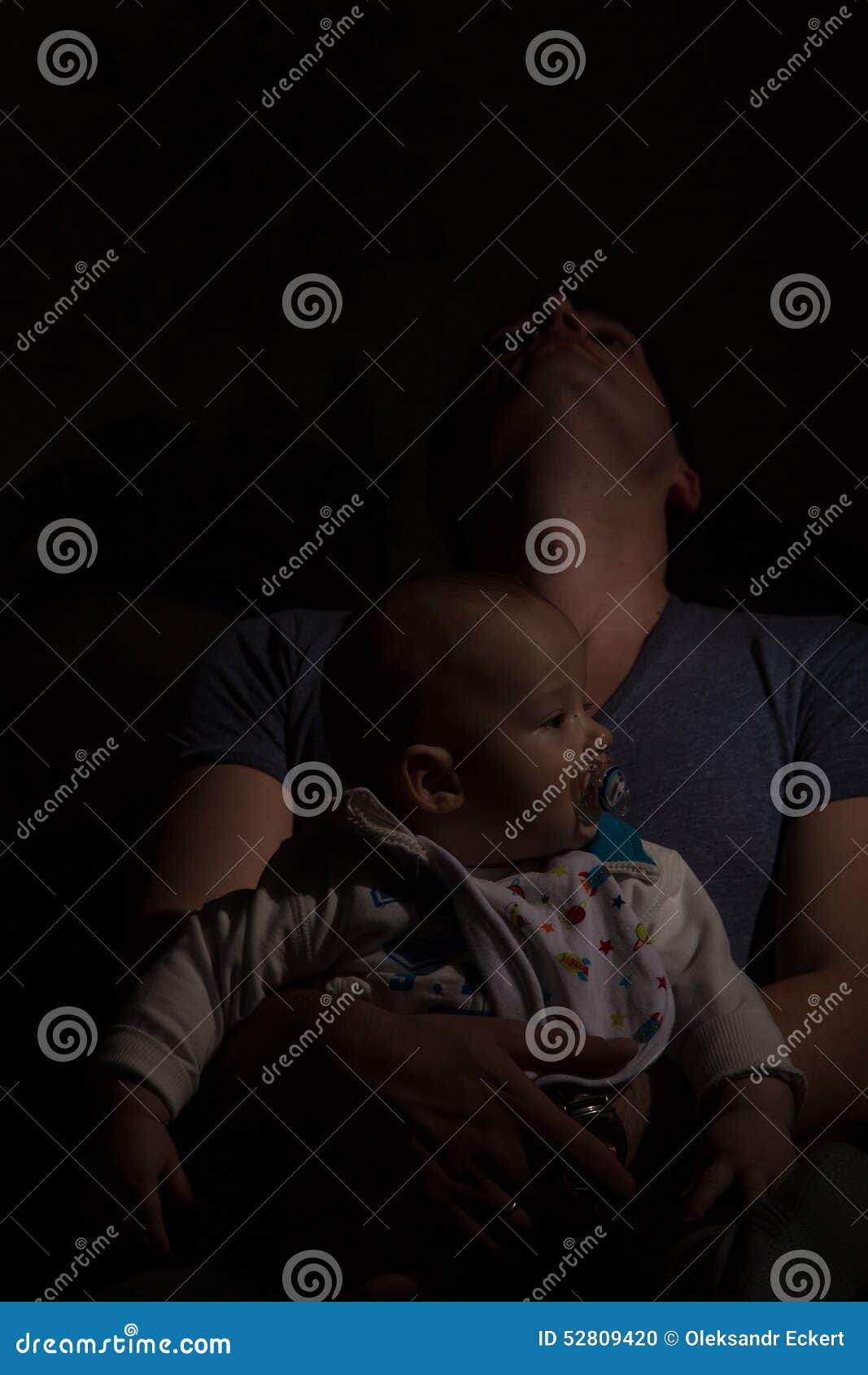 overtired single father with his son