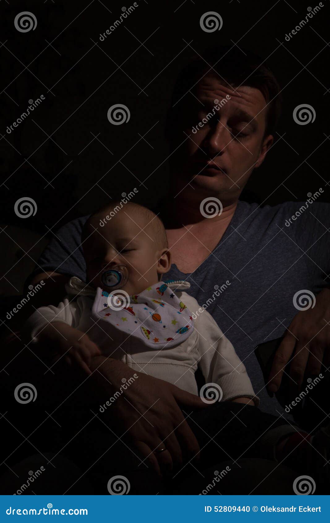 overtired single father with his son