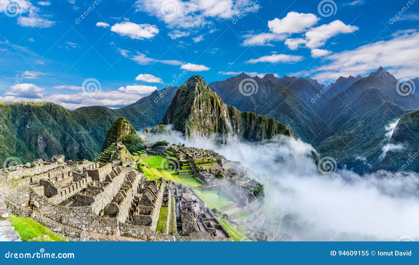 overview of machu picchu, agriculture terraces and wayna picchu peak in the background
