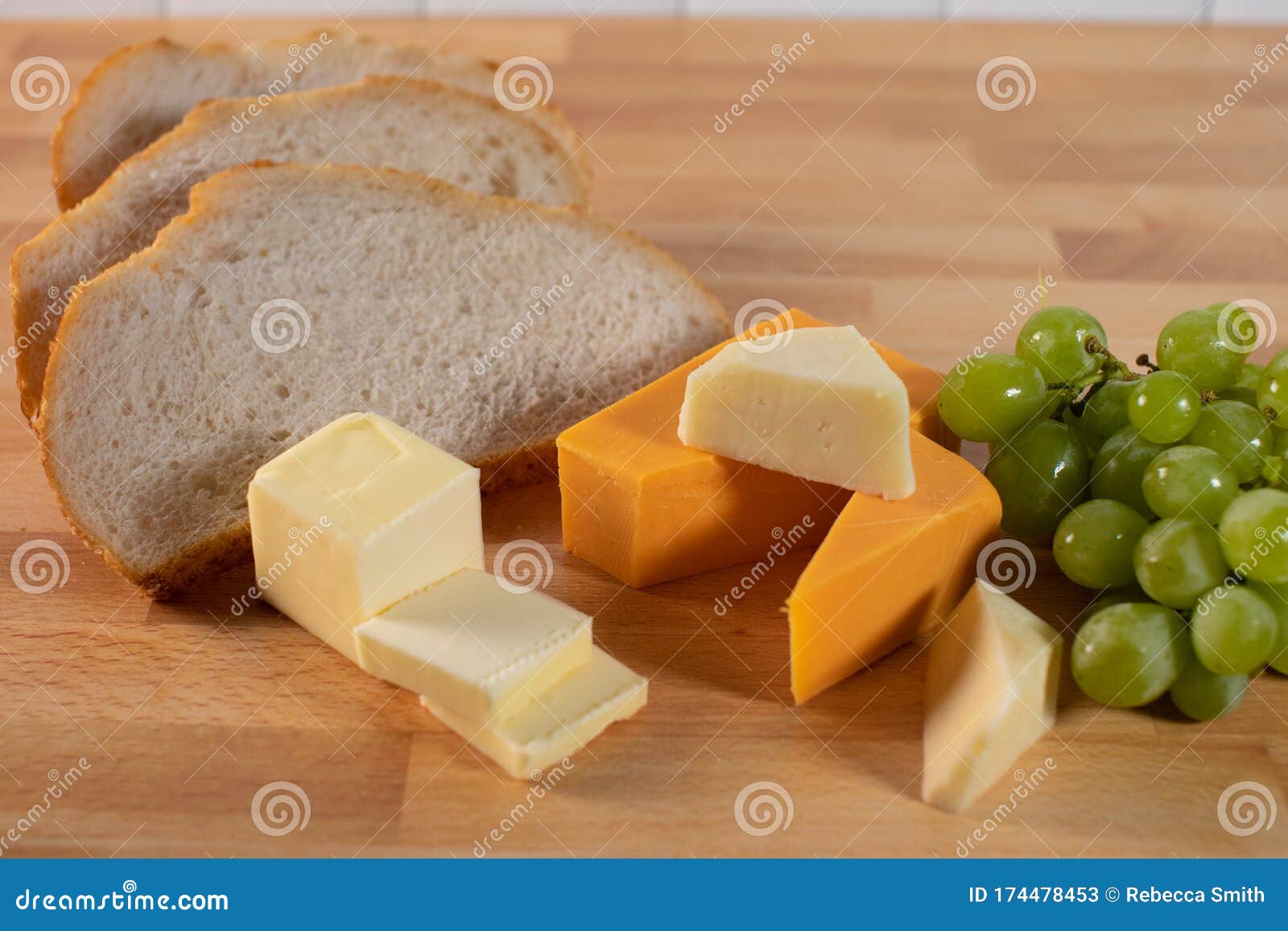 Overview Sliced Bread Butter Asserted Cheeses Green Grapes Stock Image Image Of Bread Food