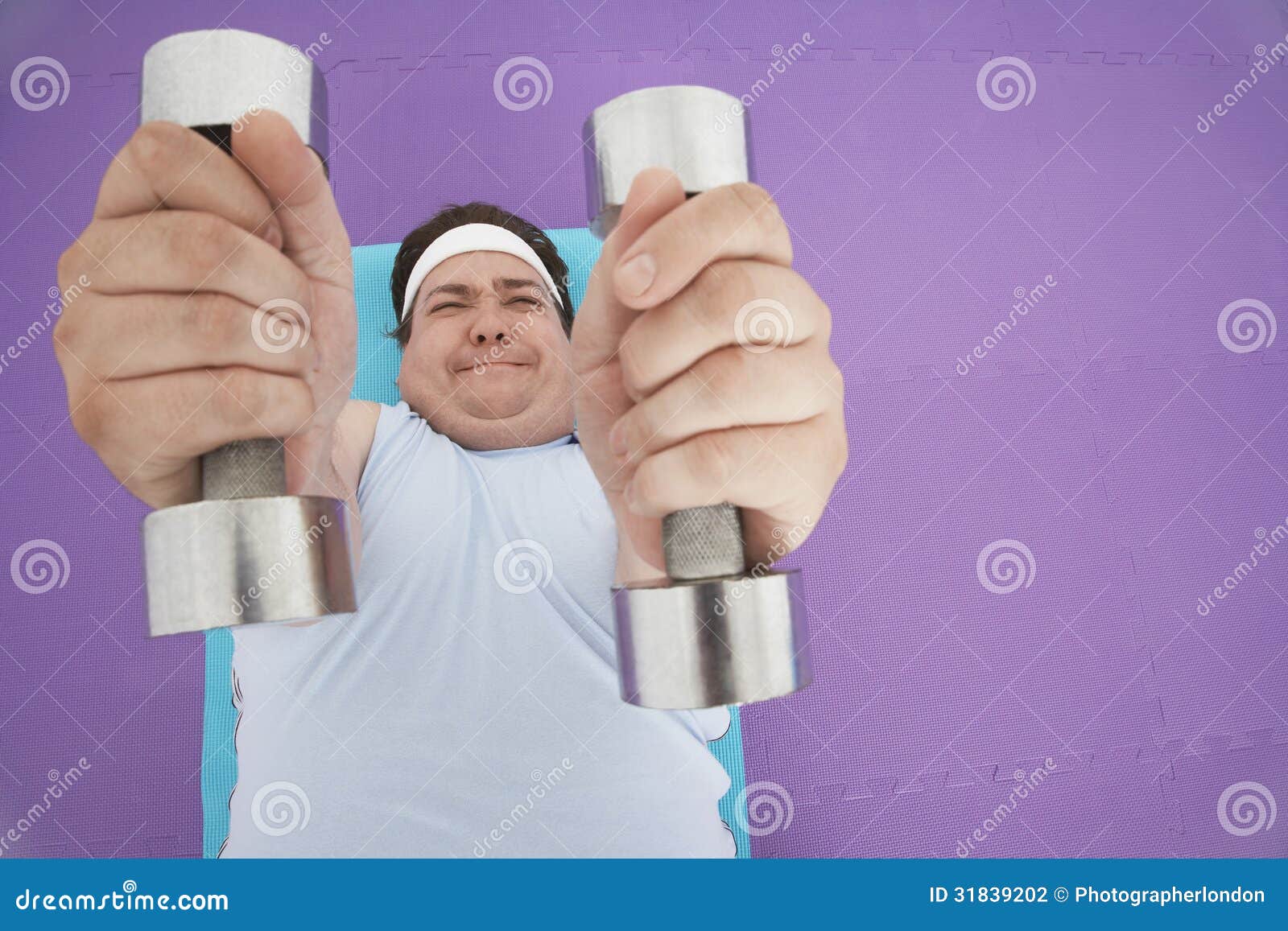Overweight Man Lifting Dumbbells Stock Photo Image of looking