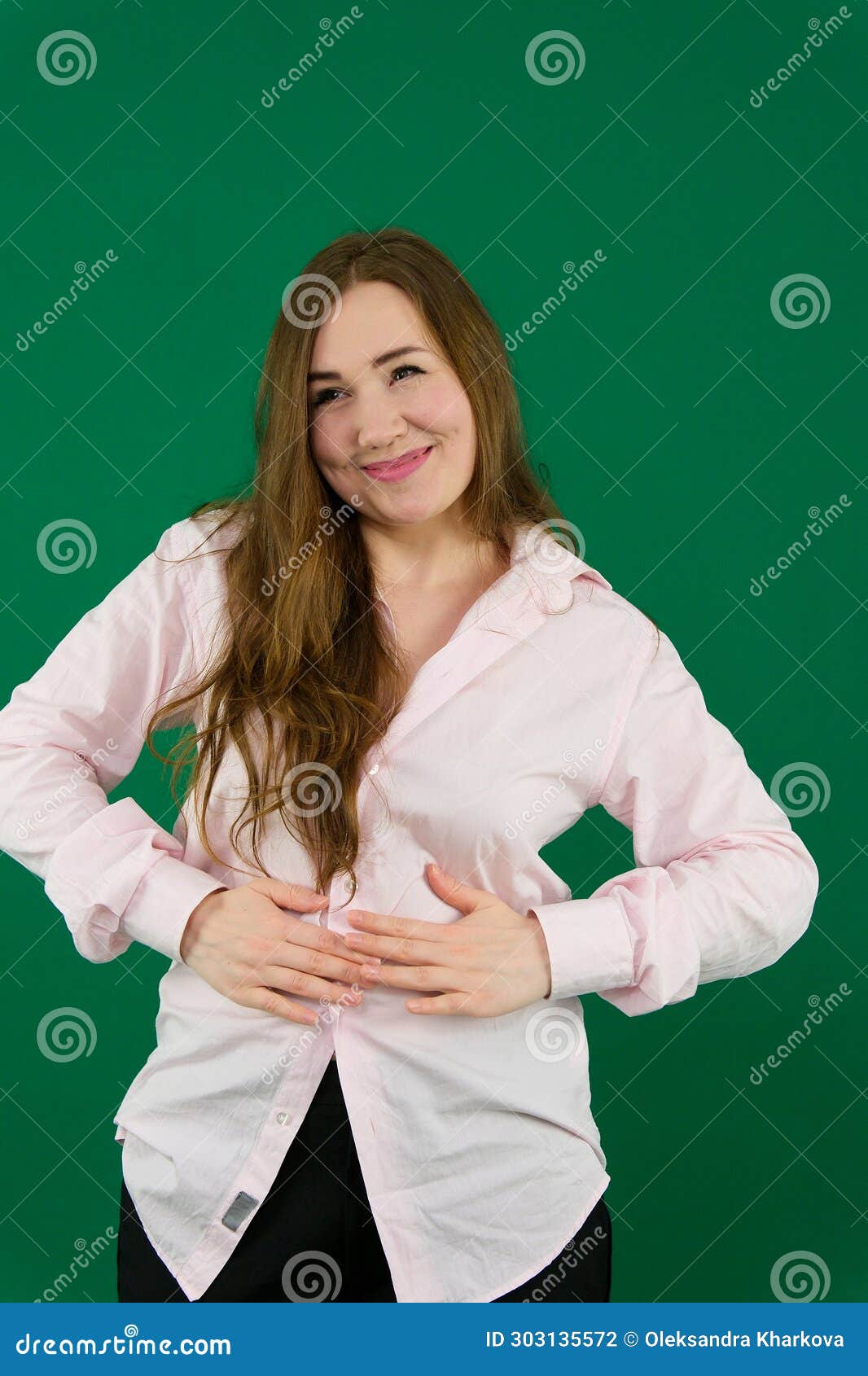 Foto de Woman wearing tight clothes on light grey background, closeup.  Overweight problem do Stock