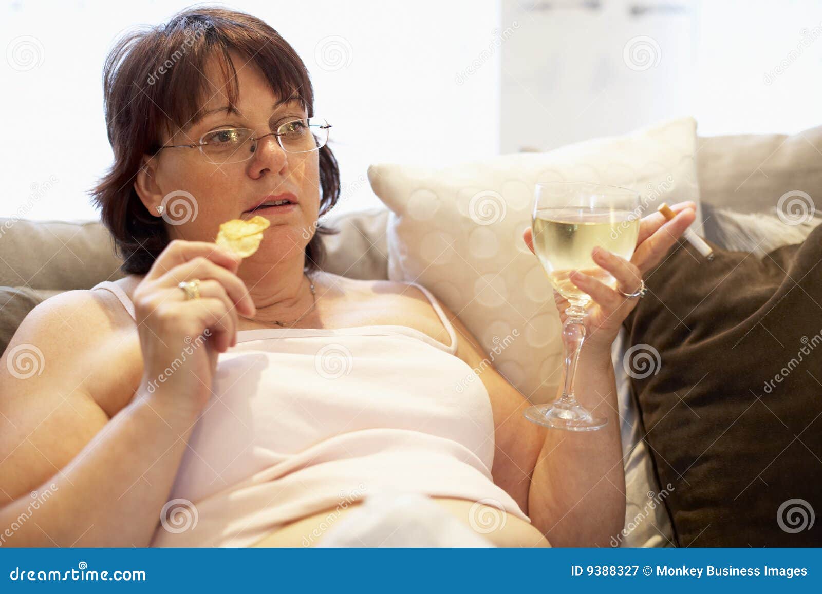 Overweight Woman Relaxing on Sofa Stock Image Image of body, aged