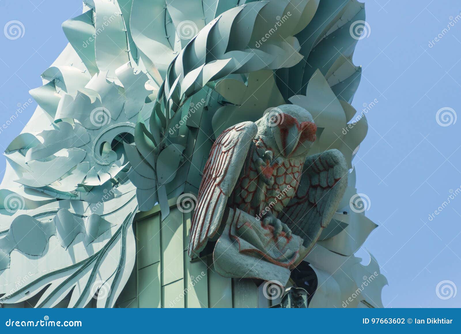 An Owl Statue on a Building Roof Editorial Photography Image of