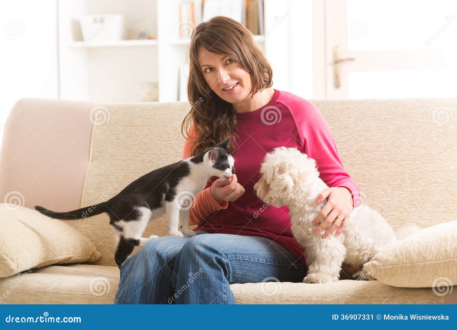 owner with cat and dog