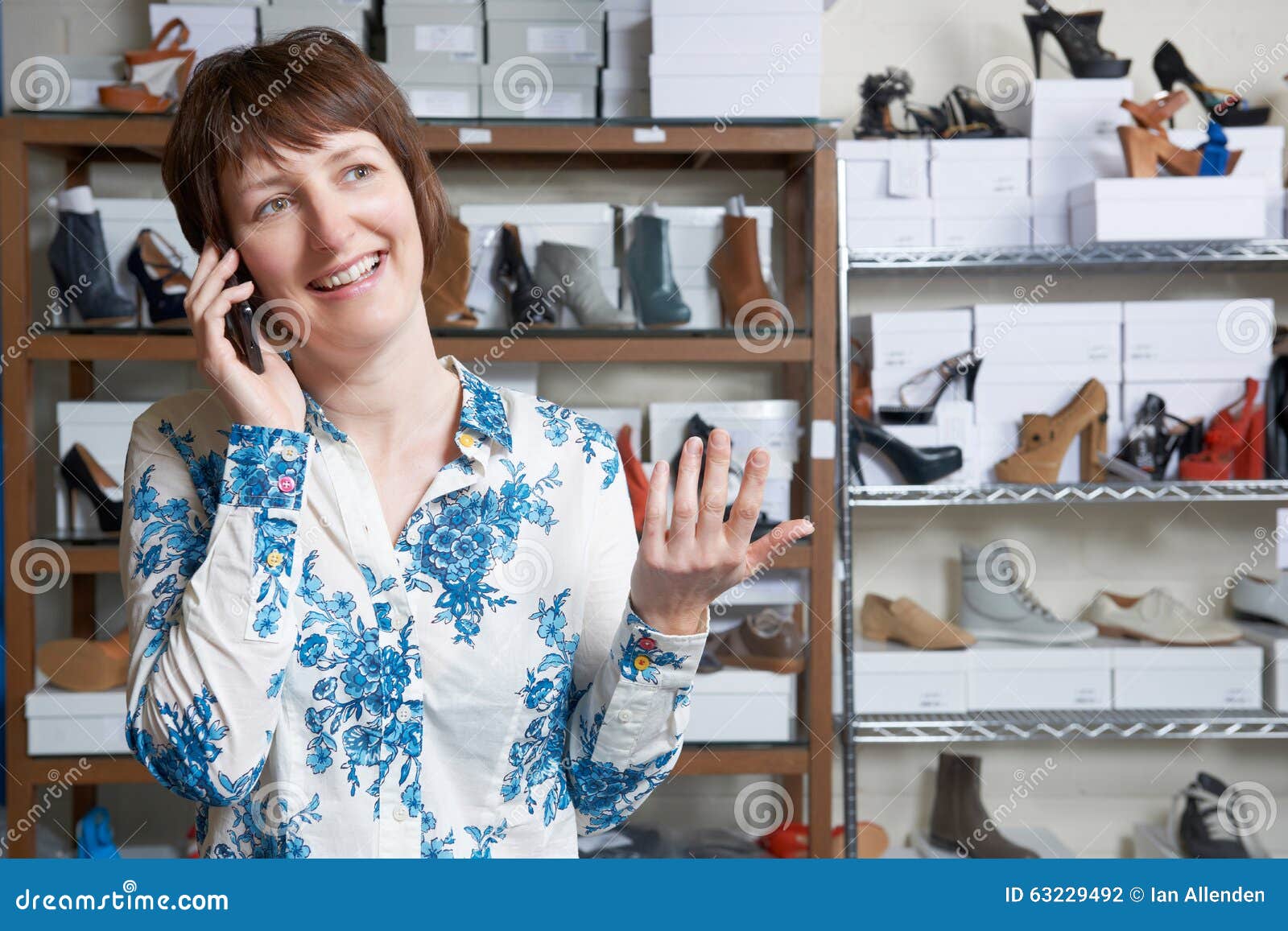Owner of Shoe Store on Phone Stock Photo Image of sale, horizontal