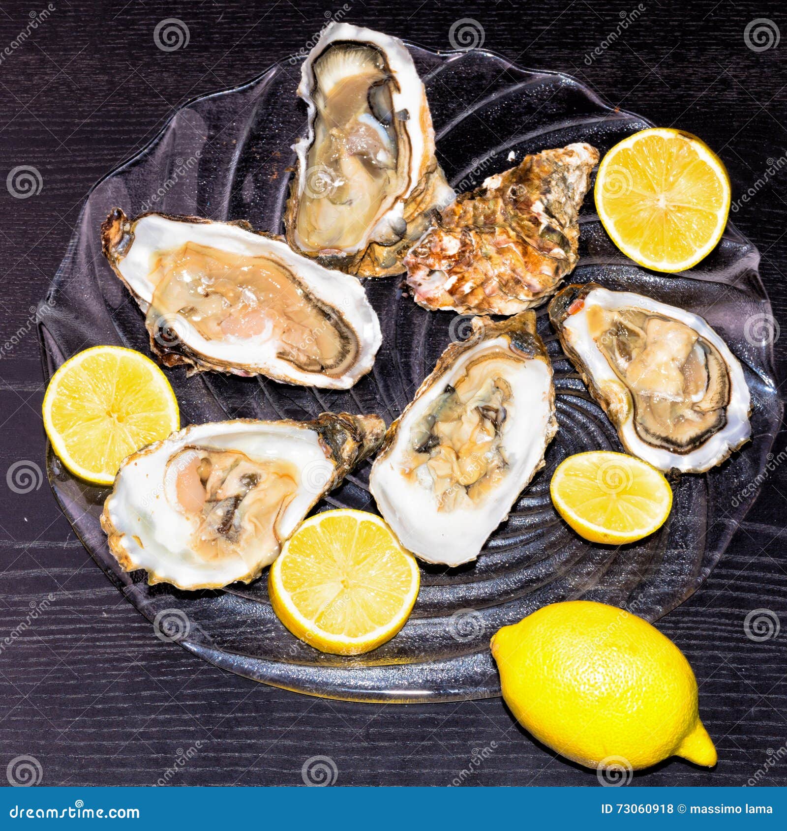 Oysters with lemon stock photo. Image of lunch, seafood 73060918