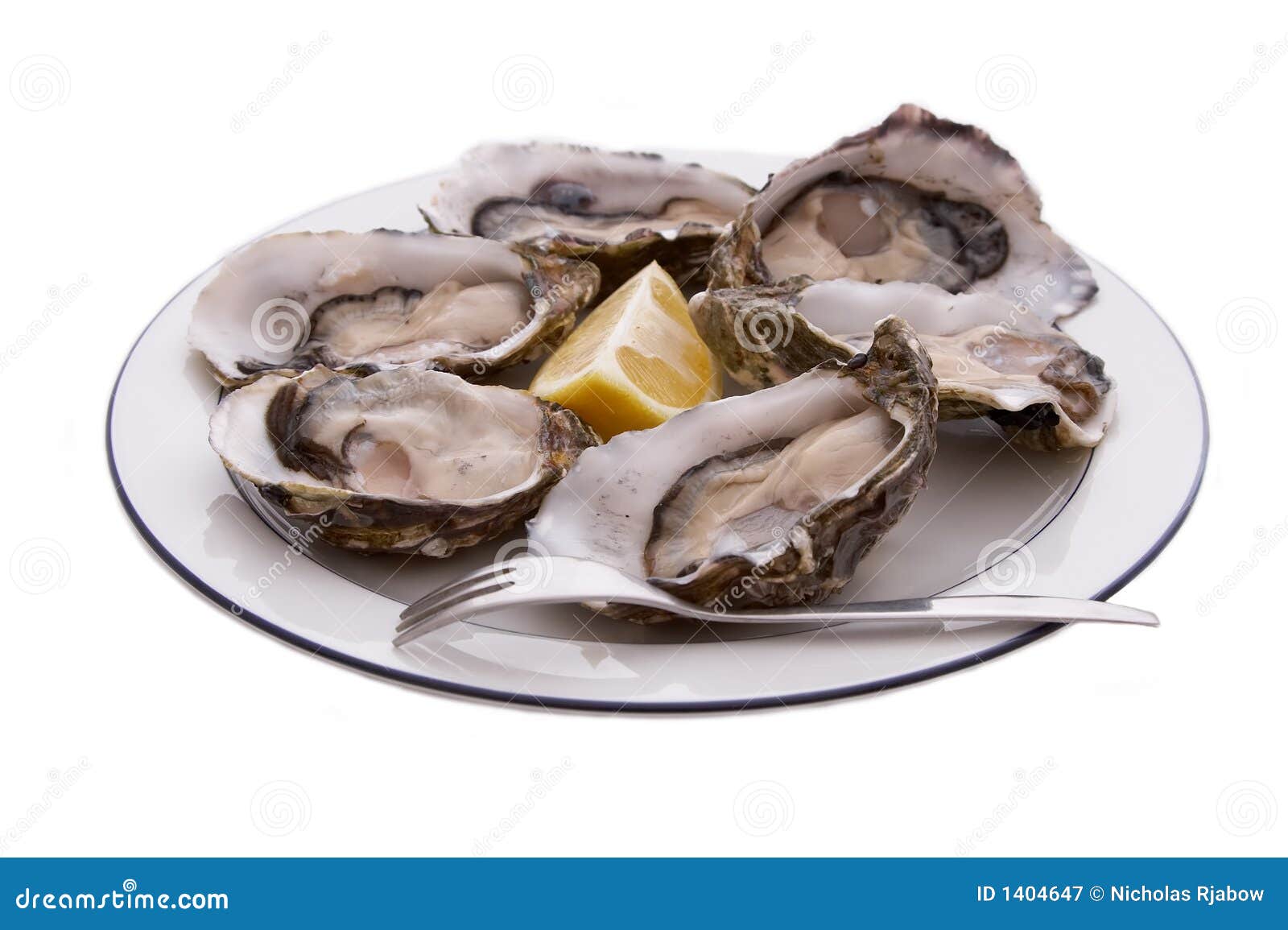 Oysters, Lemon and Fork stock image. Image of dozen, plate 1404647