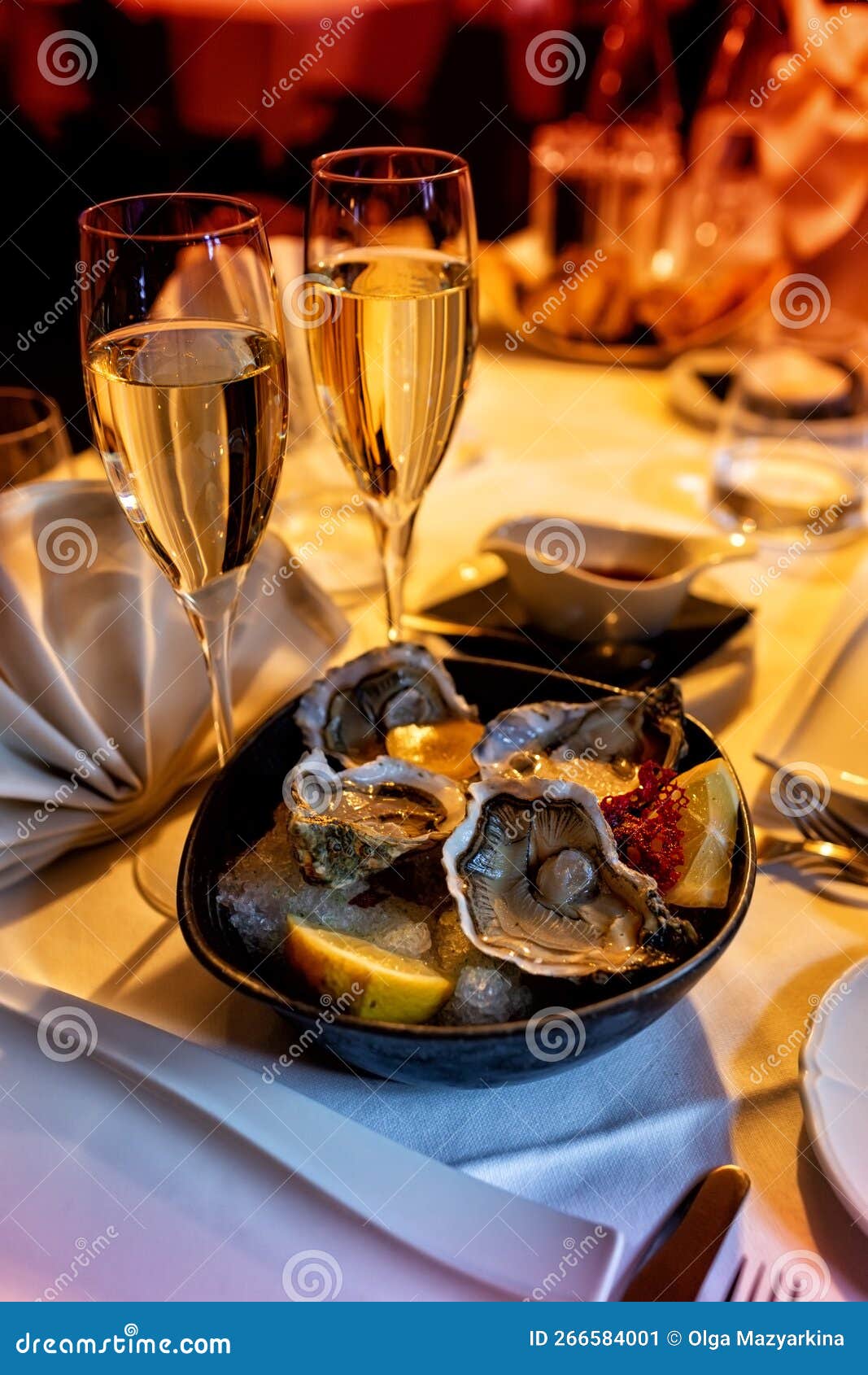 oysters and wine. romantic dinner table for two, restaurante.