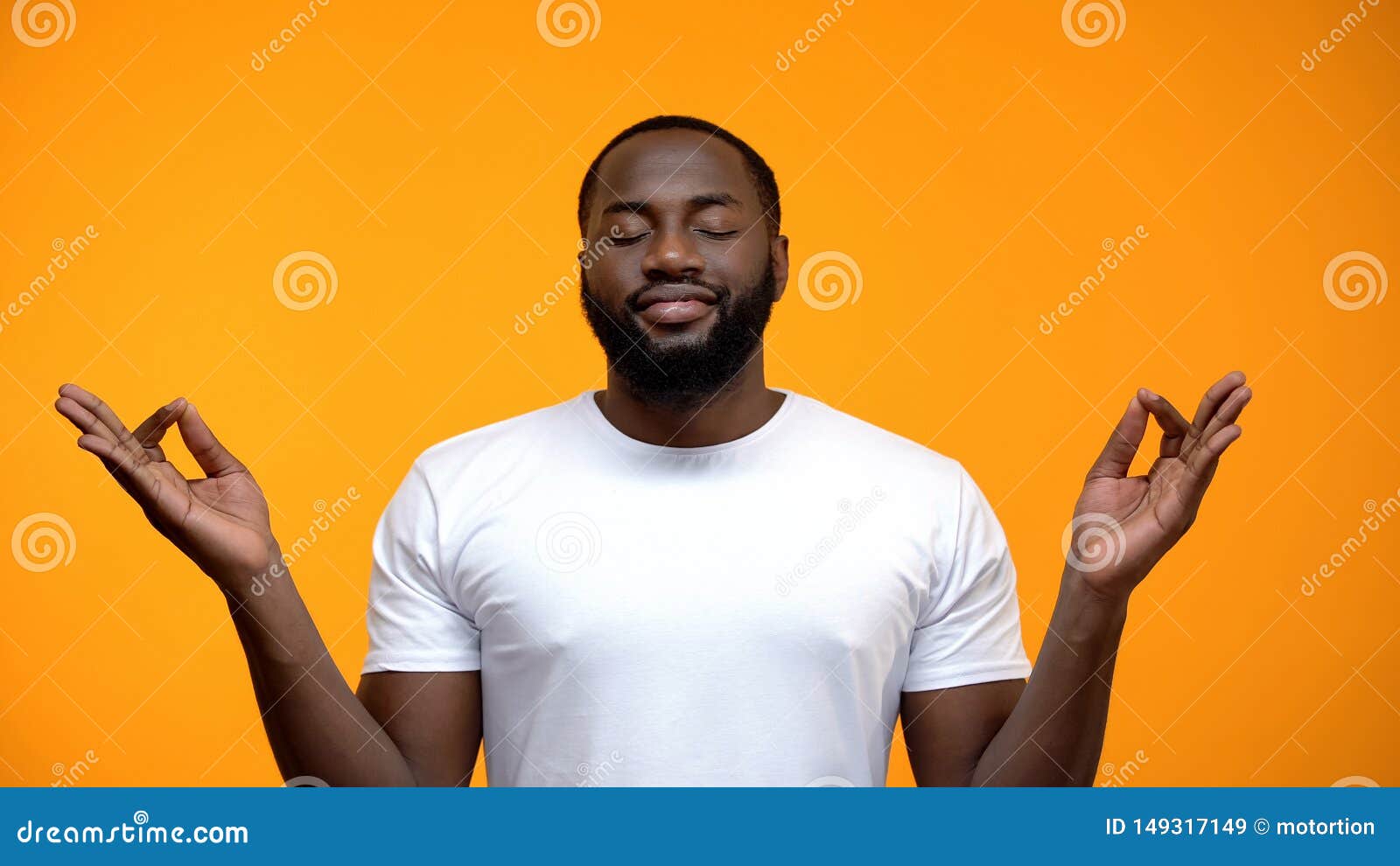 pacified black man meditating against yellow background, breathing exercises