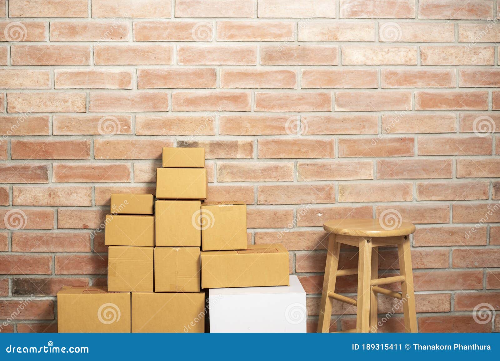 Packaging Boxes Stacked On Pallets In Storage Warehouse. Cardboard