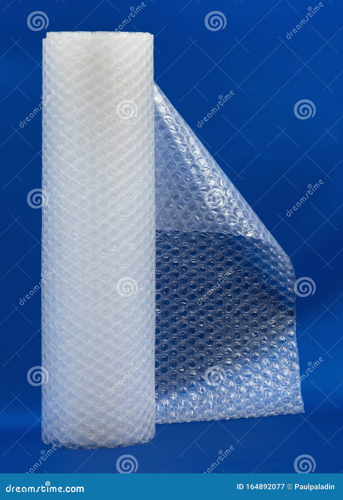 Packaging Bubble Wrap Roll on Blue Stock Image Image of plastic