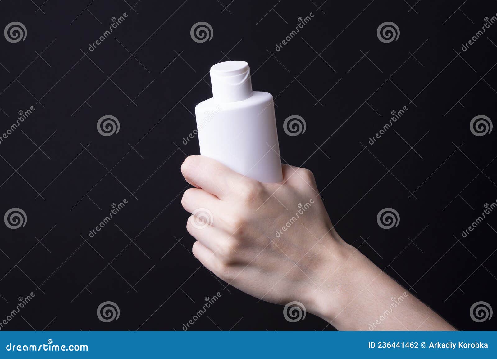 Packaging of Lotion or Hand Cream in Female Hands Stock Photo Image