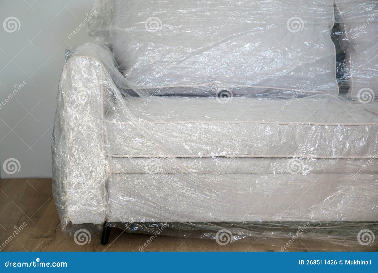 Packed Sofa in the Living Room. the Concept of Moving Stock Photo