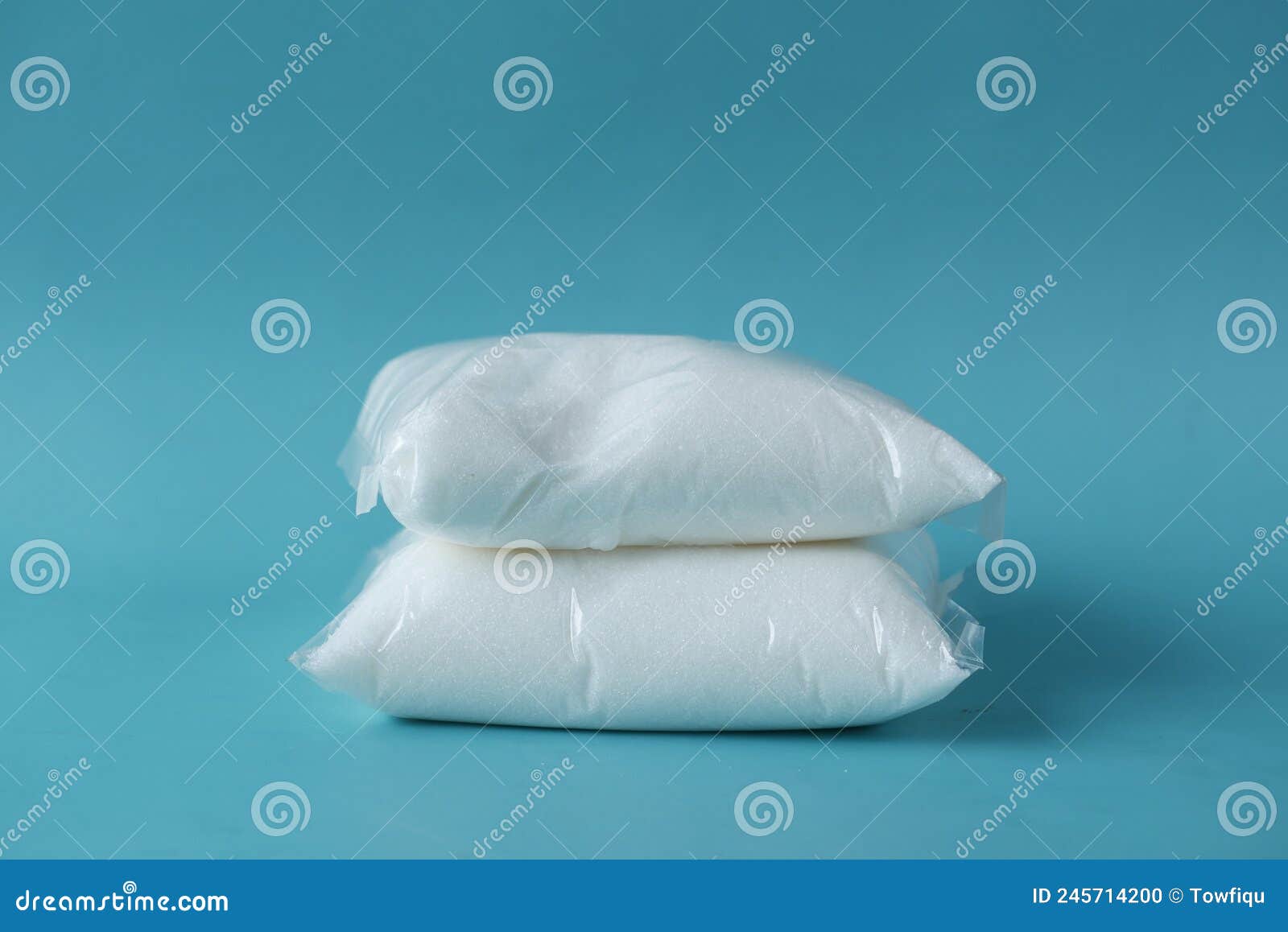 Packet of a White Sugar on Blue Background Stock Photo Image of