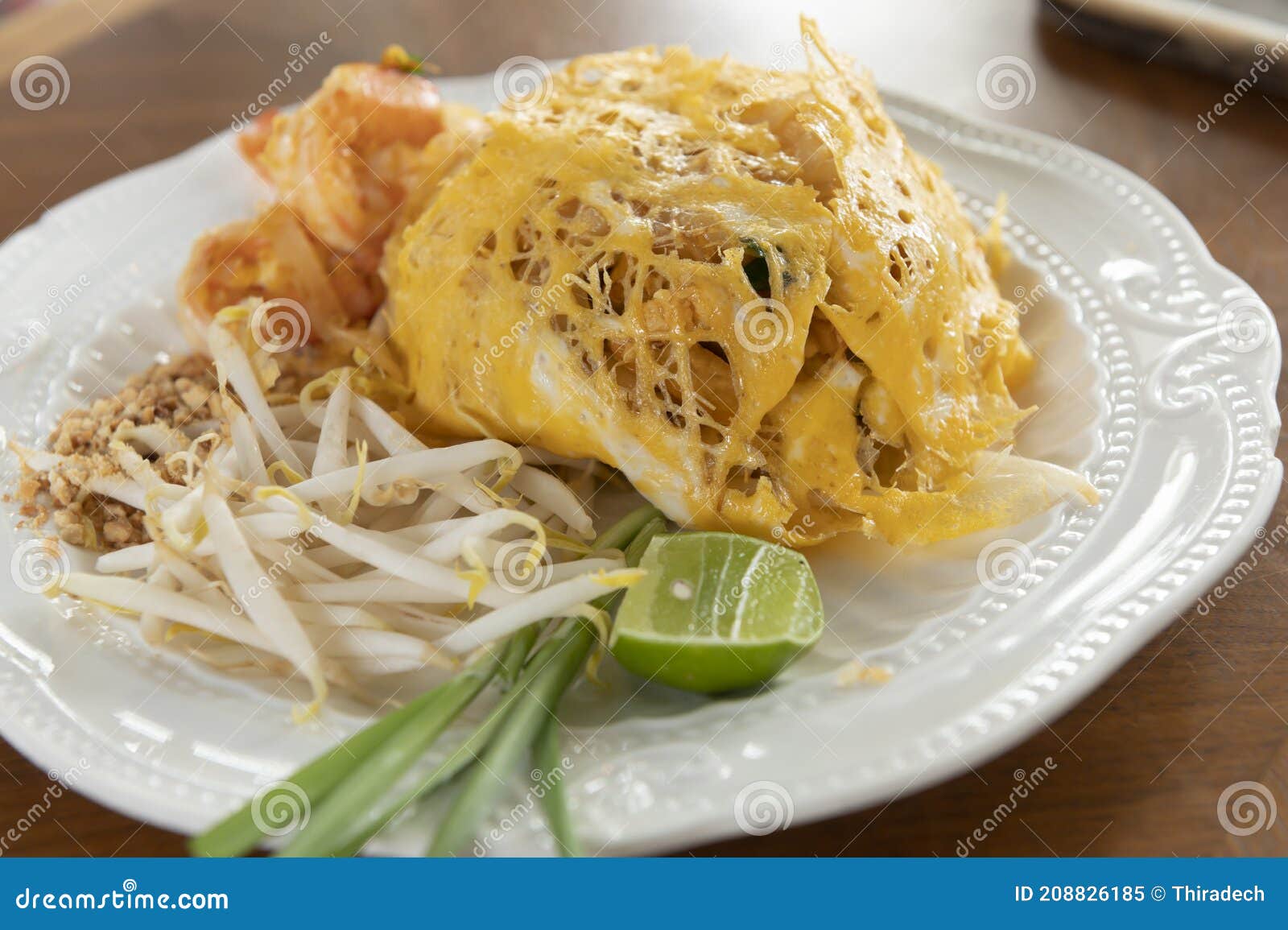Pad Thai Wrapped in Egg on a White Plate Stock Image Image of tasty
