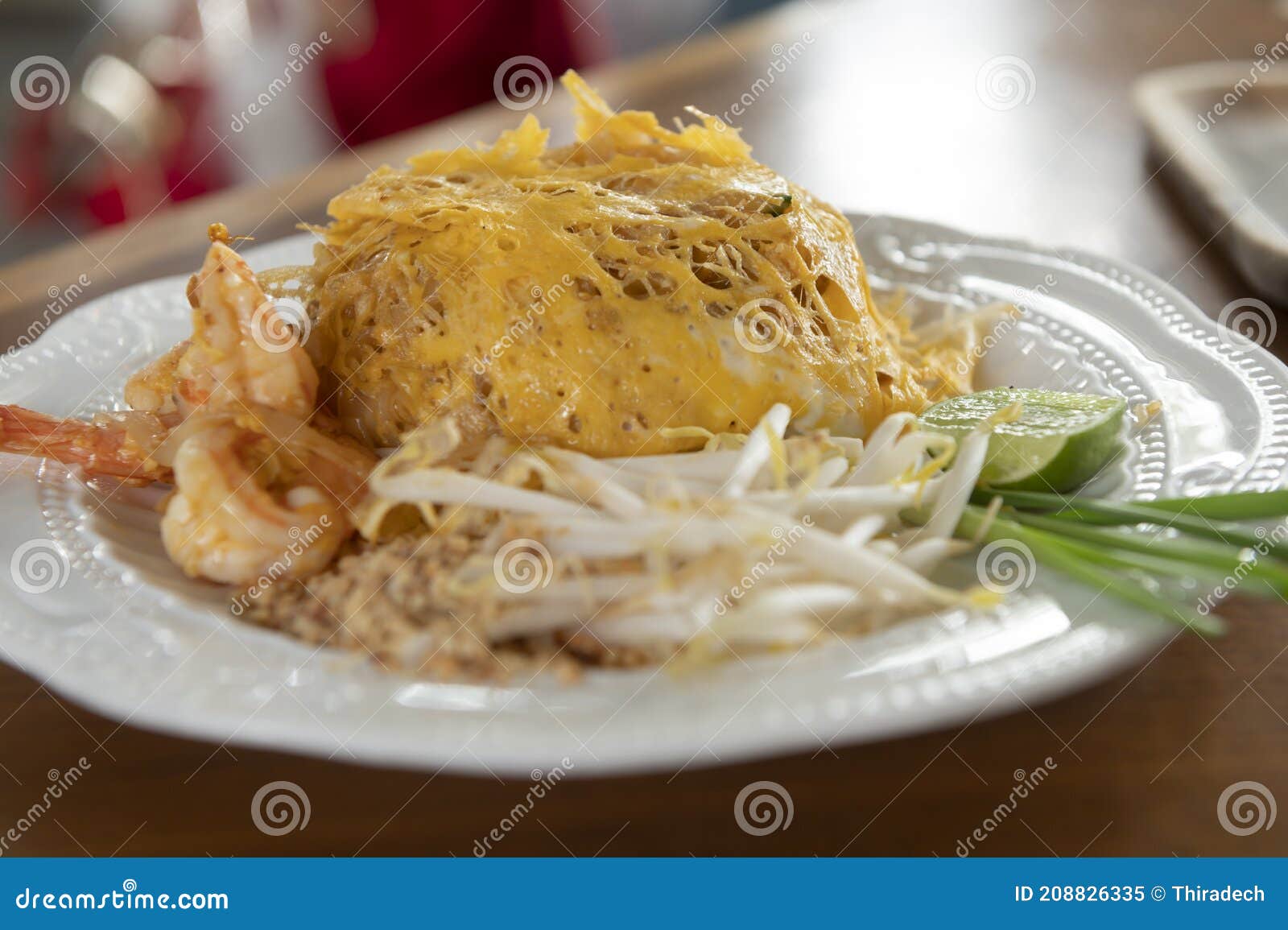 Pad Thai Wrapped in Egg on a White Plate Stock Image Image of noodle