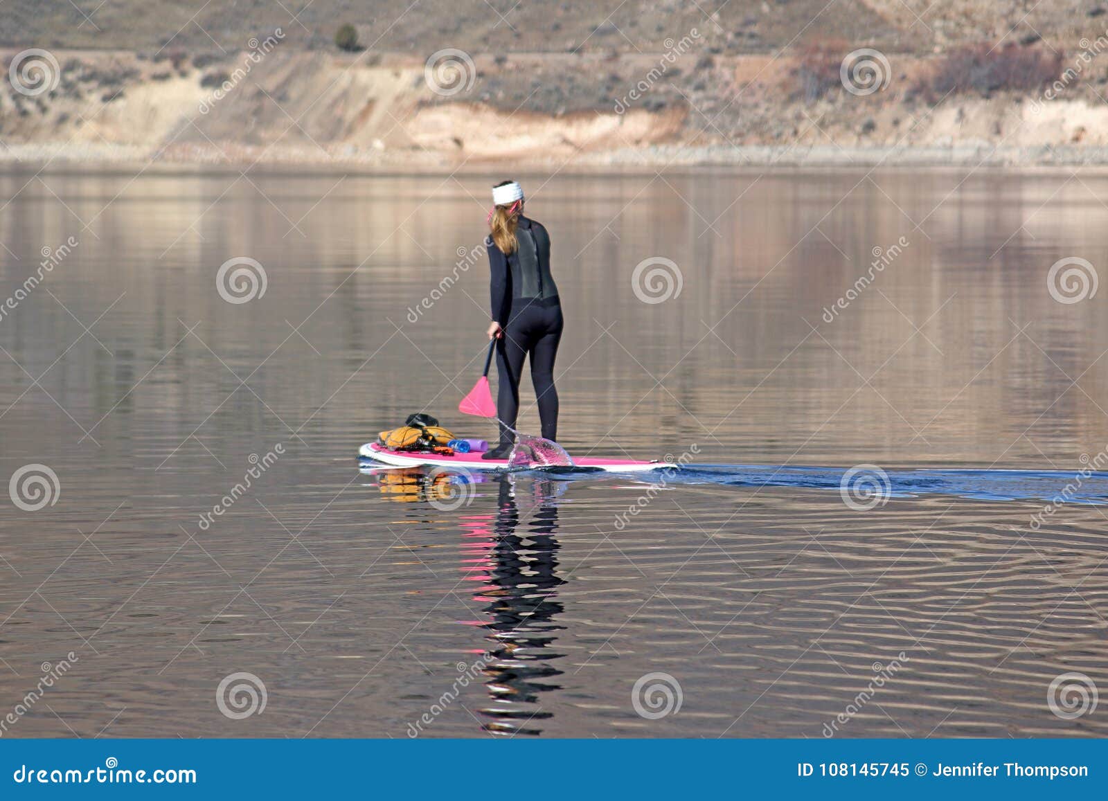 Paddle Boarder in winter editorial image. Image of slopes - 108145745