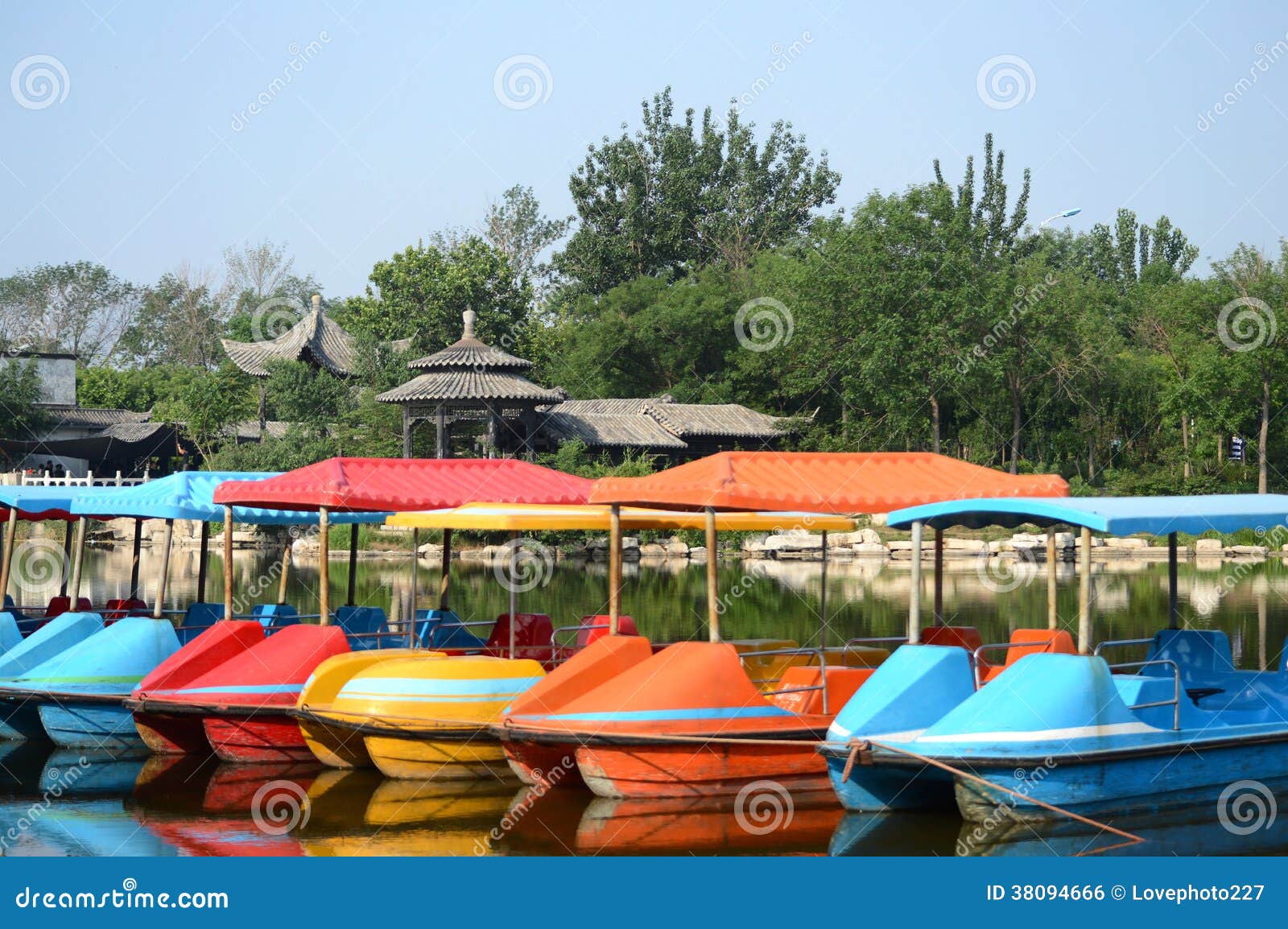 Paddle boats in park stock photo. Image of pavilion, park 38094666