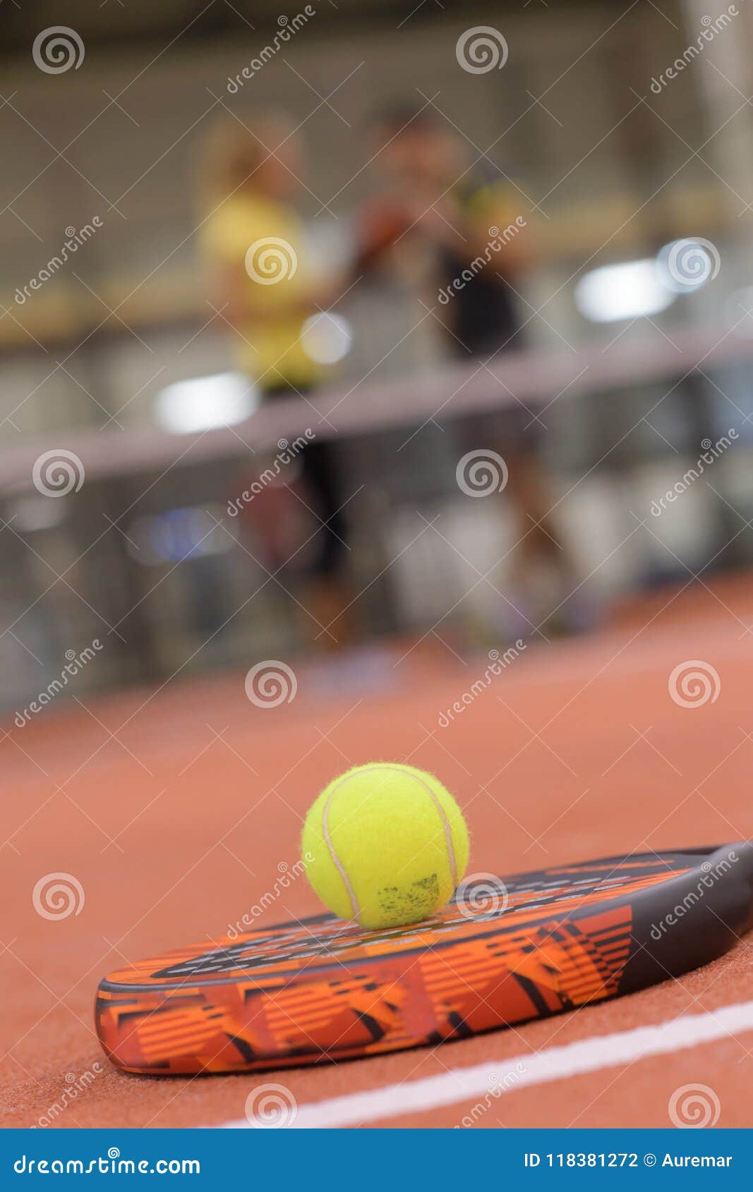 padel racket and ball