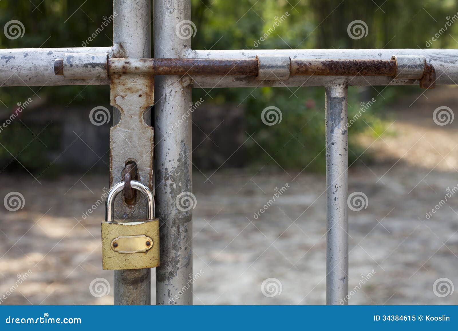 Padlock on the metal door stock image. Image of security 34384615