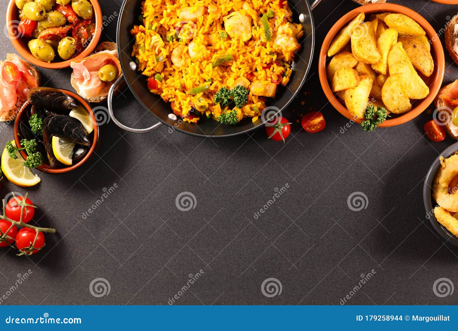 Paella and tapas stock photo. Image of diet, cooked 179258944