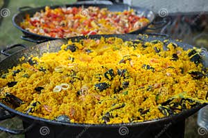 Paella Traditional Spanish Food Paella Prepared On A Large Pan On The 