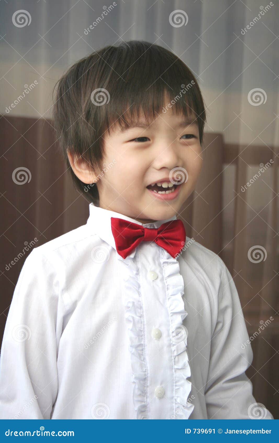 Page Boy with Red Bowtie Smiling Stock Image Image of youth, formal