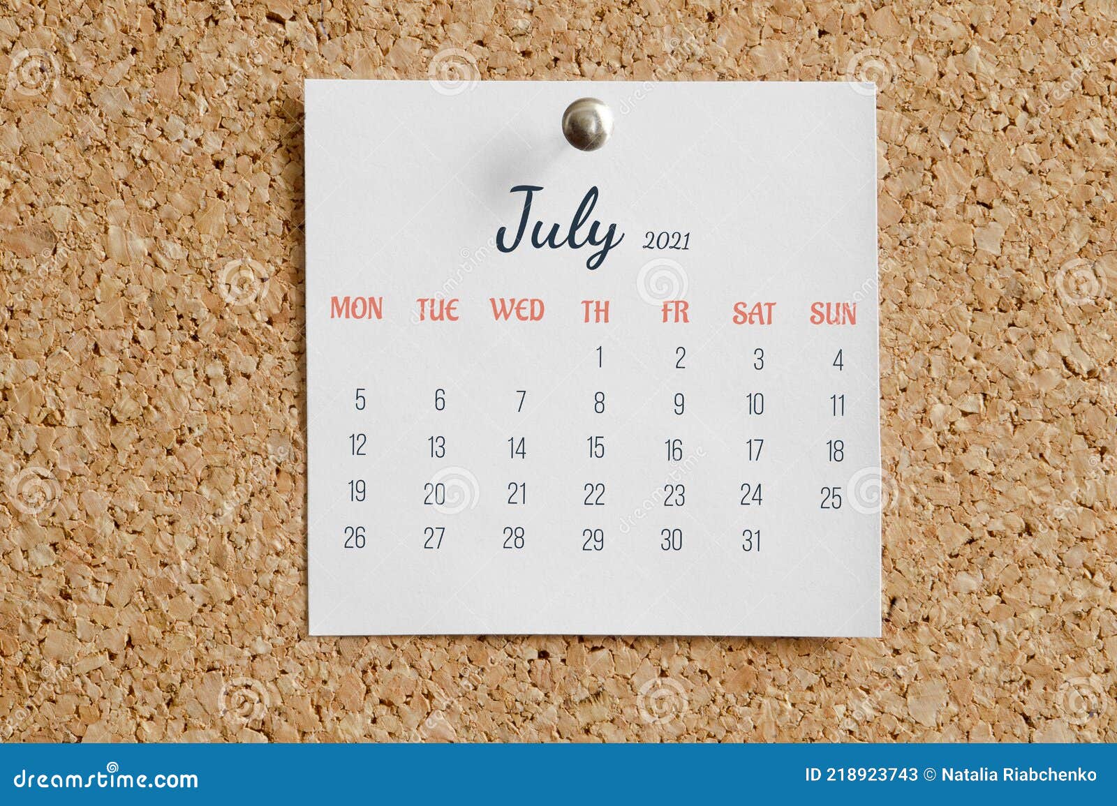 page from calendar for full month: june 2021. white sheet with dates is pinned to cork board. concept of calendar date