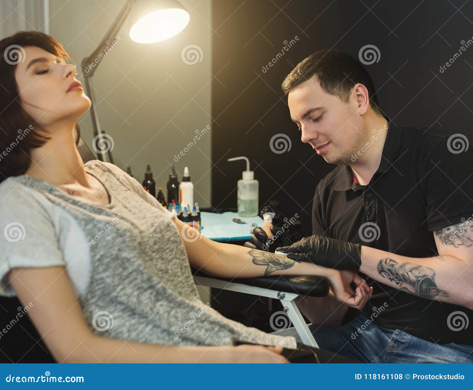 Painful Body Tattooing Process, Master Working in Studio Stock Photo -  Image of hurt, modification: 118161108