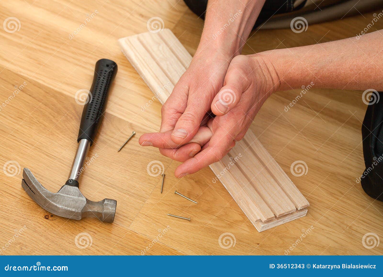 Painfull hammering stock image. Image of decoration, builder 36512343