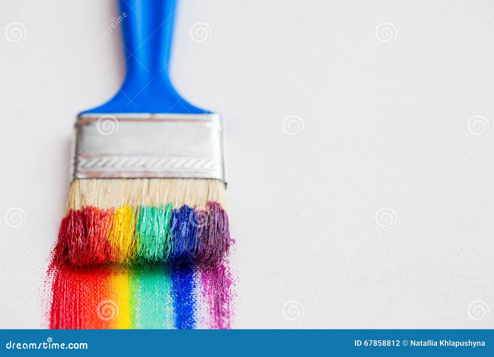 paint brushes in a colorful wave paint brushes in a colorful wave