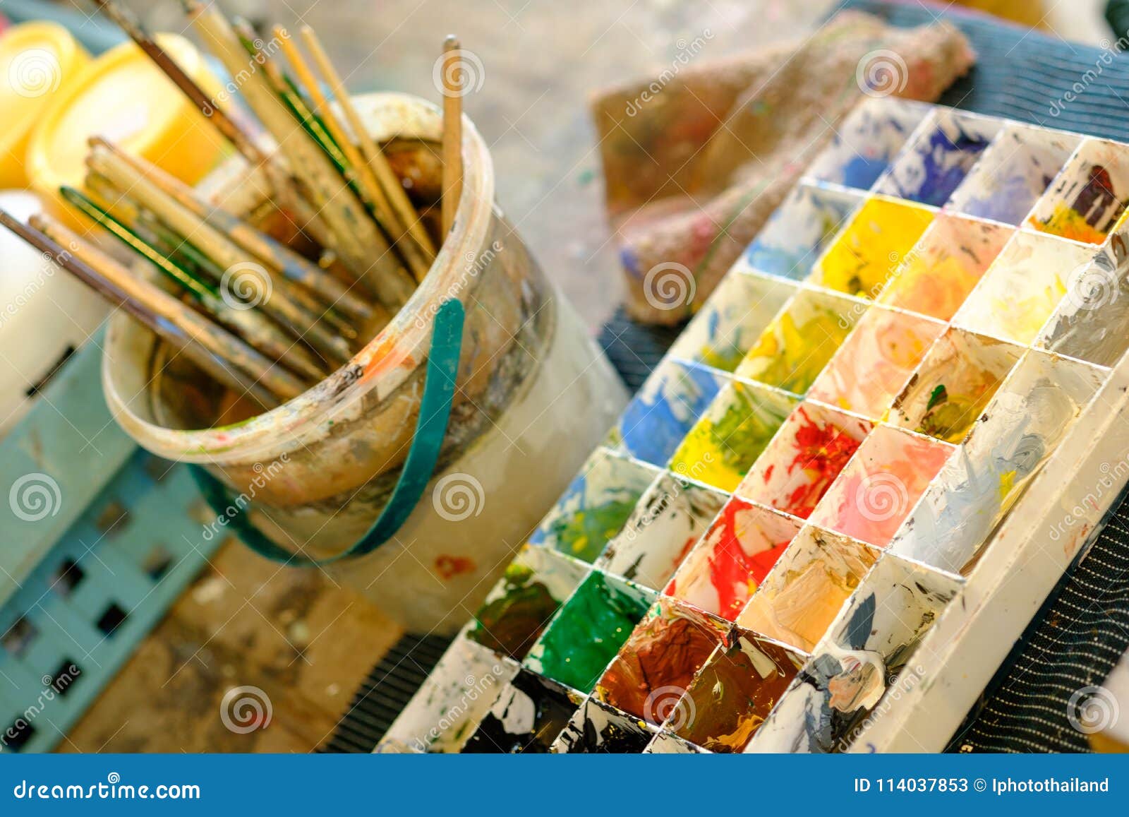 Artist Paint Brushes in White Bucket of Water, Acrylic Colour in