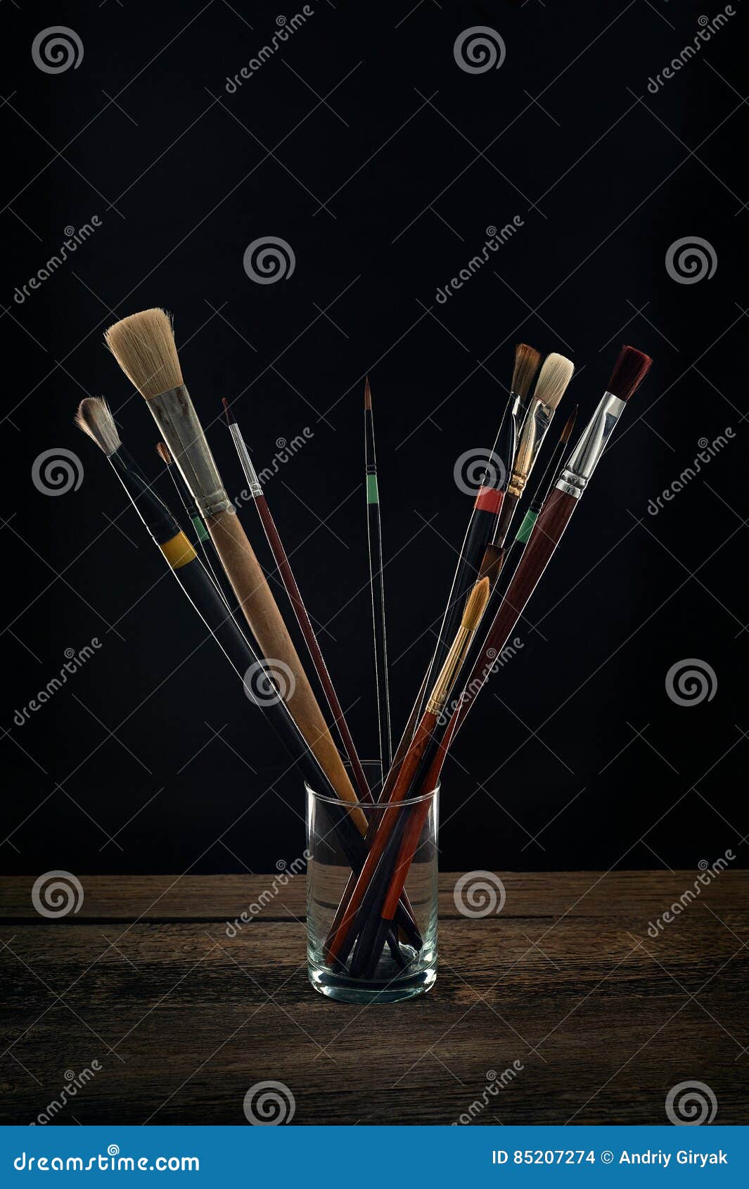 Paint brushes in a glass stock photo. Image of closeup 85207274