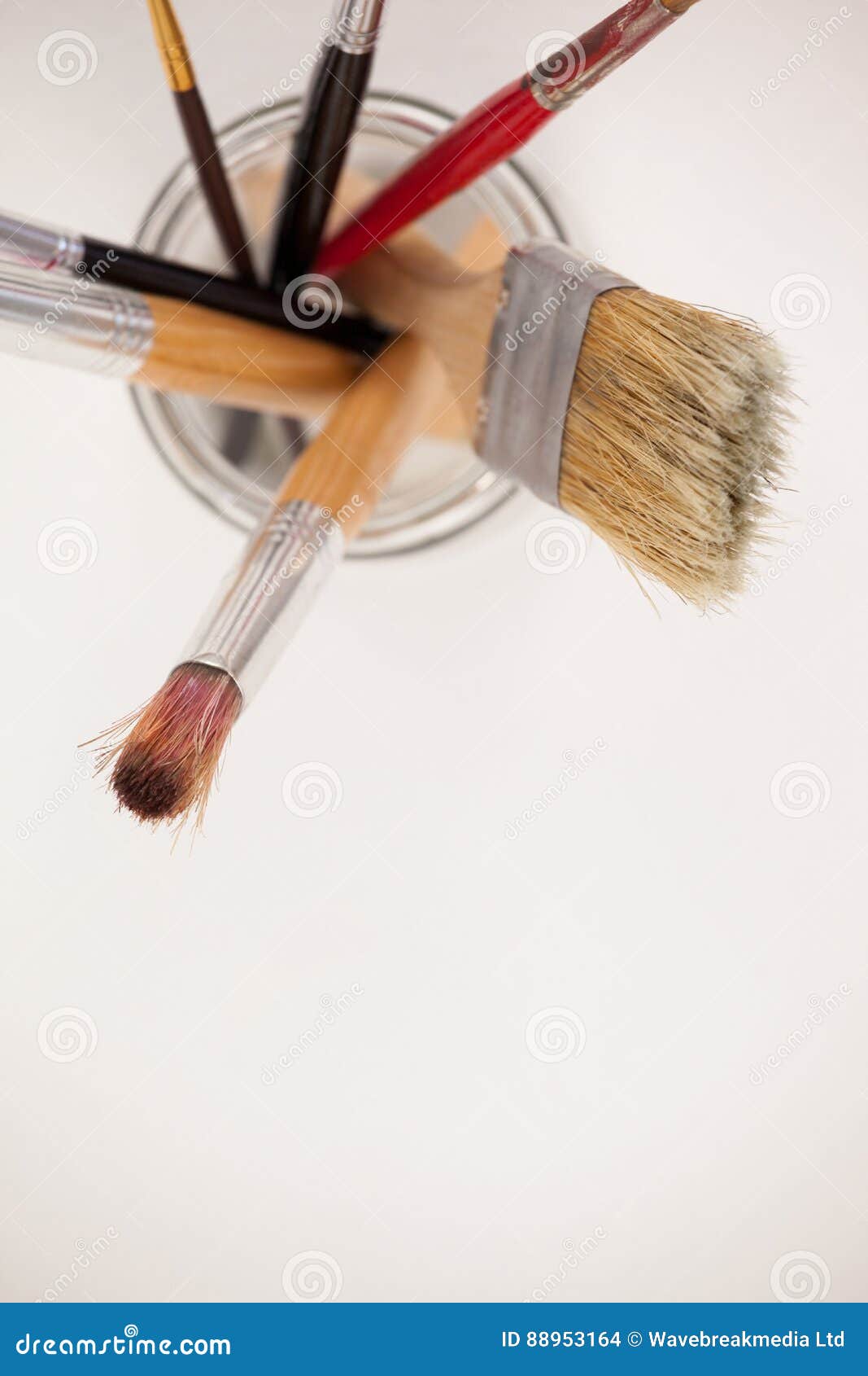 Paint Brushes In Glass Jar Against White Background Stock Photo Image