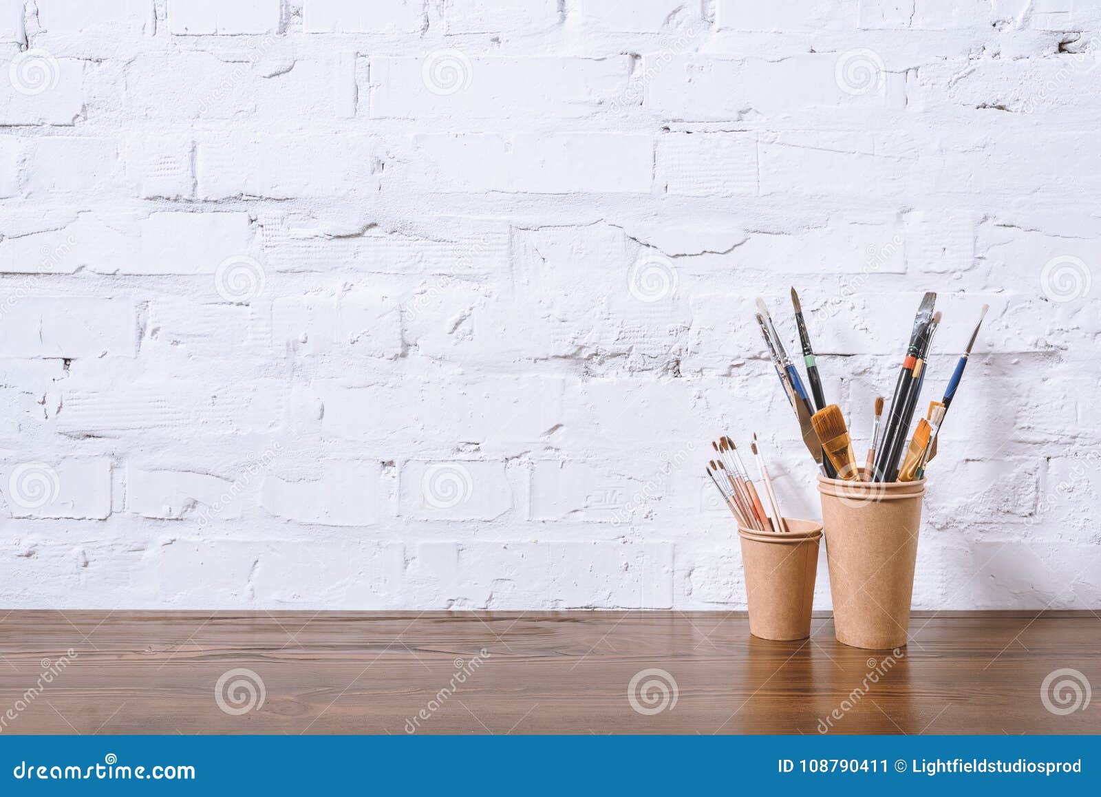 Paint Brushes in Paper Cups Stock Image - Image of brown, objects