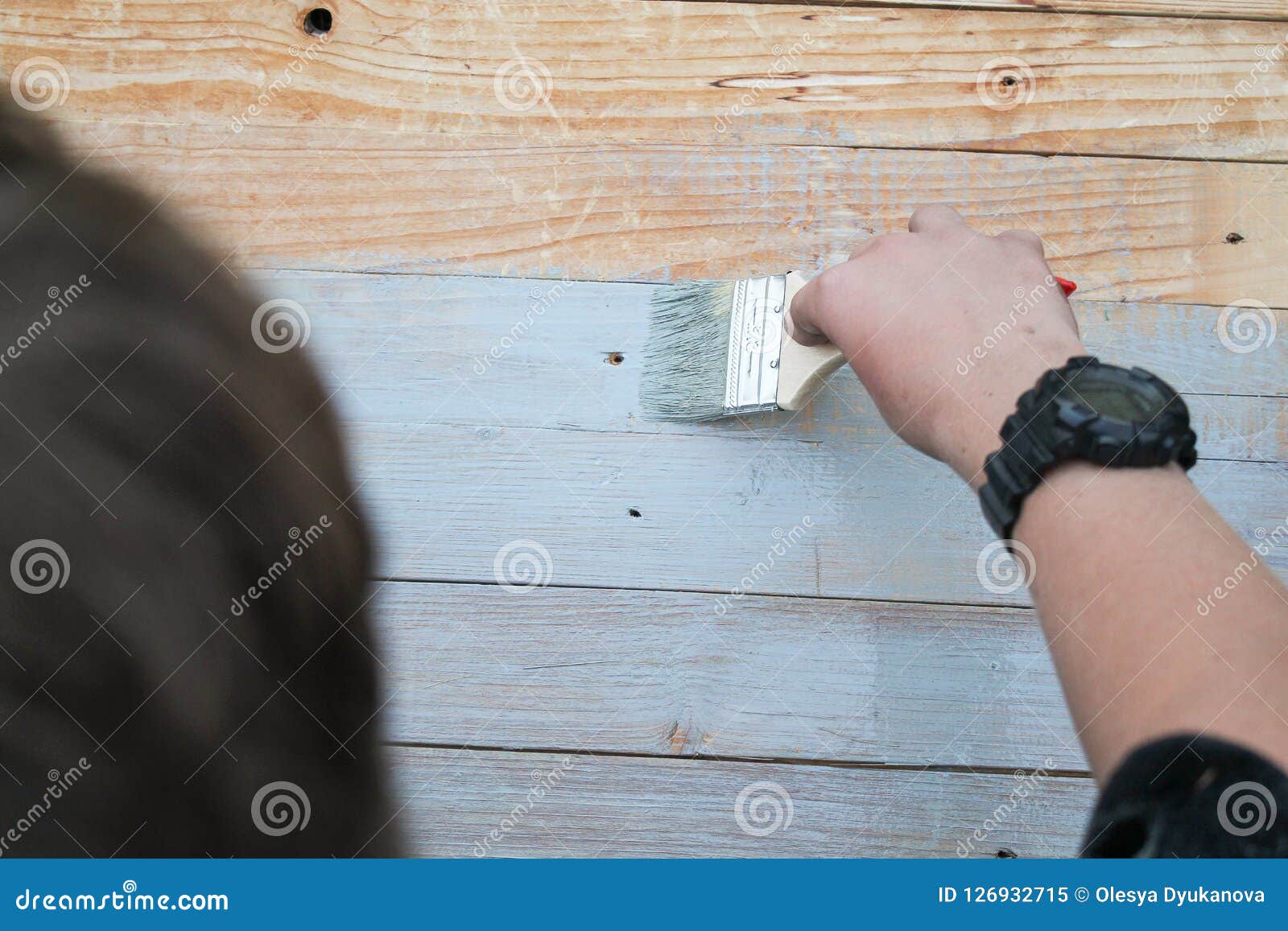Master Paints Old Wooden Floor With Gray Brush Background Stock