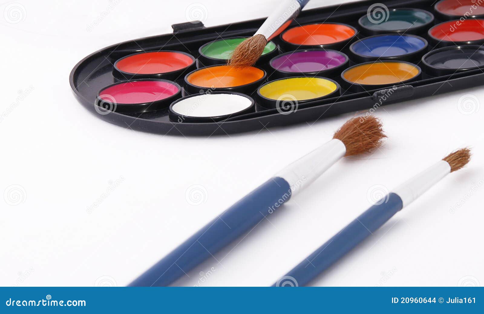 Paint palette and brushes stock photo. Image of colors 20960644