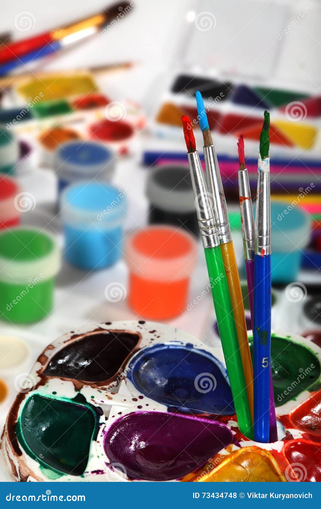 Paint Palettes and Brushes. Selective Focus Stock Photo Image of